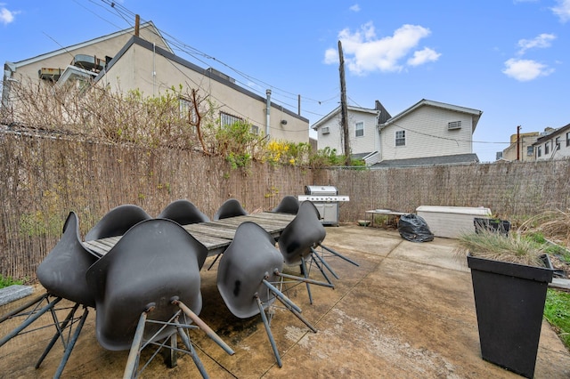 338 Hendrix St, Brooklyn, NY 11207 - view of patio with fence, a residential view, and a grill