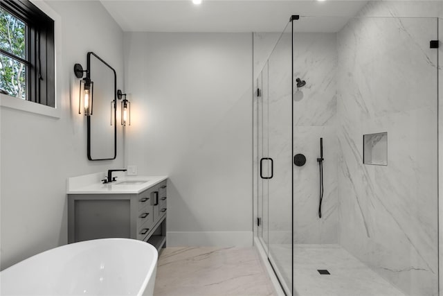466 Montauk Hwy, Westhampton Beach, NY 11978 - bathroom with vanity, a marble finish shower, marble finish floors, and a freestanding tub