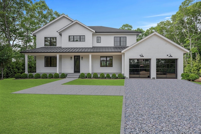 466 Montauk Hwy, Westhampton Beach, NY 11978 - modern inspired farmhouse with a standing seam roof, a metal roof, and covered porch