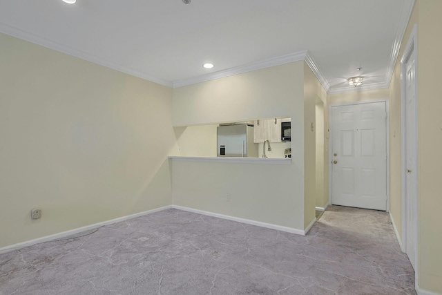 500 Pondside Dr Unit 2E, White Plains, NY 10607 - carpeted spare room featuring crown molding, baseboards, and recessed lighting