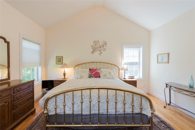 19 Old Bulls Head Rd, Rhinebeck, NY 12572 - bedroom with light wood-type flooring, lofted ceiling, and baseboards