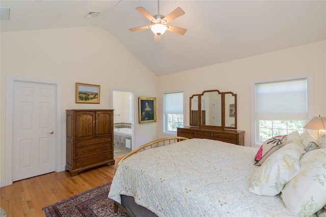 19 Old Bulls Head Rd, Rhinebeck, NY 12572 - bedroom featuring multiple windows, light wood finished floors, high vaulted ceiling, a ceiling fan, and ensuite bath