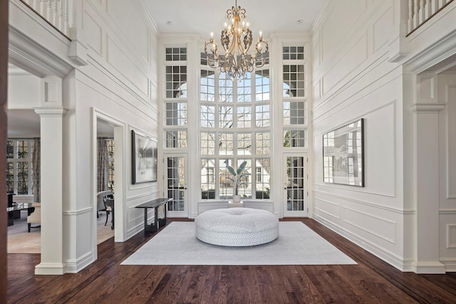 24 Penwood Rd, Bedford Corners, NY 10549 - interior space with a decorative wall, a towering ceiling, and a wealth of natural light