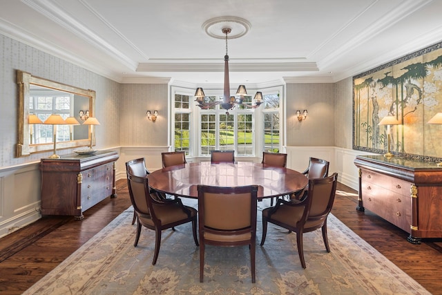 24 Penwood Rd, Bedford Corners, NY 10549 - dining area featuring wainscoting, a notable chandelier, wallpapered walls, and dark wood-style floors