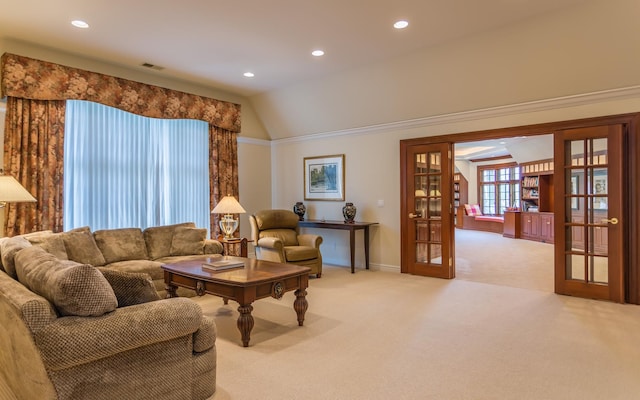 24 Penwood Rd, Bedford Corners, NY 10549 - living area with light carpet, french doors, lofted ceiling, and recessed lighting