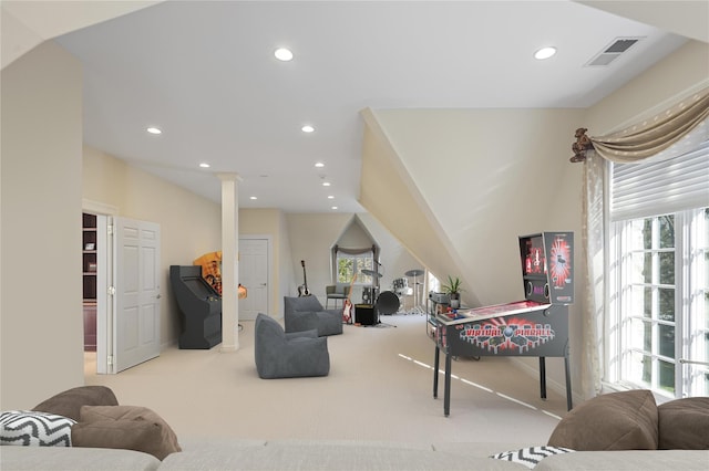 24 Penwood Rd, Bedford Corners, NY 10549 - living room with visible vents, decorative columns, carpet floors, and a healthy amount of sunlight