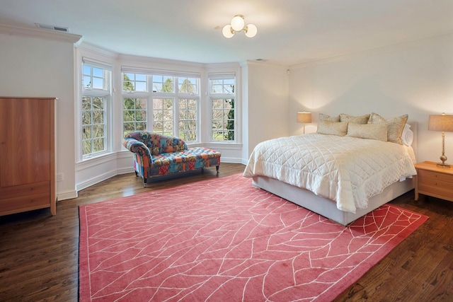 24 Penwood Rd, Bedford Corners, NY 10549 - bedroom featuring ornamental molding, visible vents, baseboards, and wood finished floors