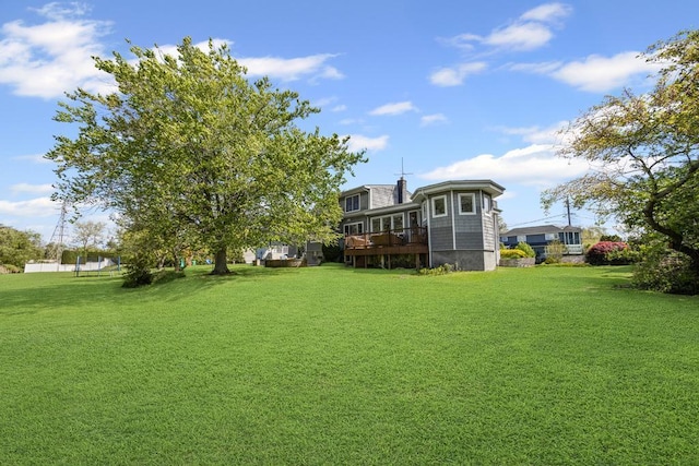 view of yard featuring a wooden deck