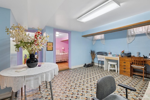 interior space with baseboards