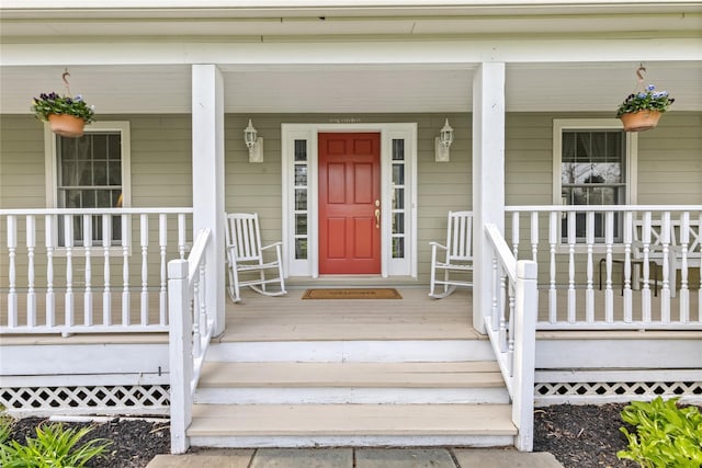 entrance to property featuring covered porch