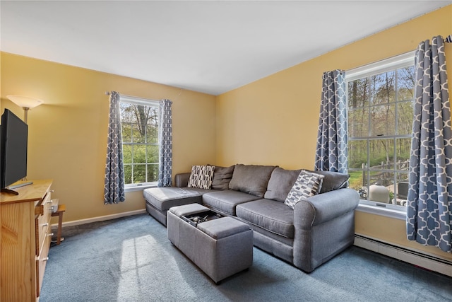 living room with carpet floors, a baseboard radiator, and baseboards