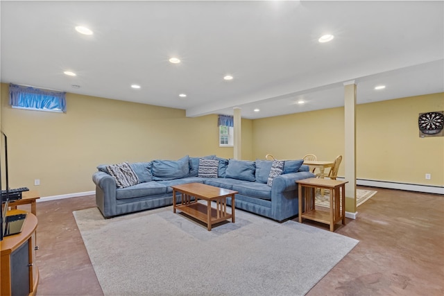 living area with recessed lighting, baseboards, concrete floors, and a baseboard heating unit