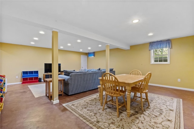 dining room with baseboards and recessed lighting