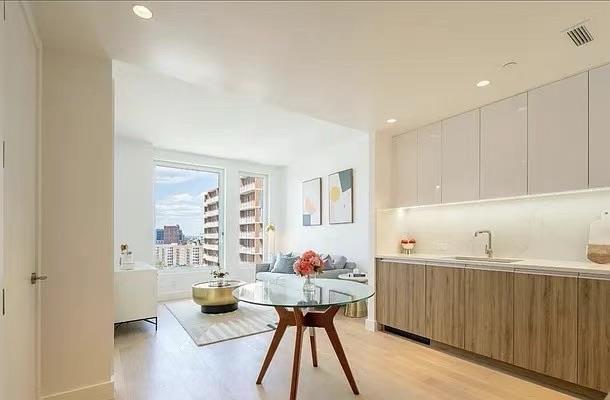 interior space with visible vents, recessed lighting, and light wood-type flooring