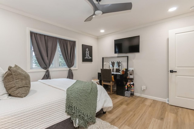 bedroom with wood finished floors, ornamental molding, baseboards, a ceiling fan, and recessed lighting