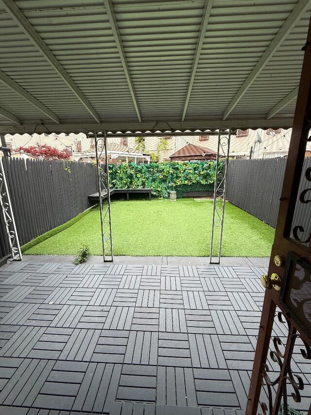 1170 Vyse Ave, Bronx, NY 10459 - fenced backyard featuring a patio