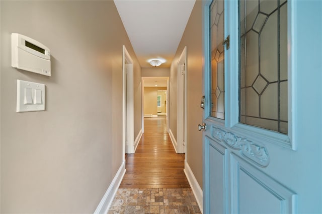 249 Cherry Ln, Airmont, NY 10901 - hall with baseboards and stone finish flooring