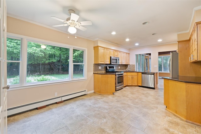 249 Cherry Ln, Airmont, NY 10901 - kitchen with appliances with stainless steel finishes, a baseboard heating unit, dark countertops, decorative backsplash, and ornamental molding