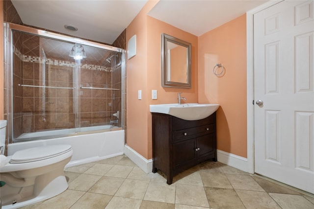 249 Cherry Ln, Airmont, NY 10901 - full bathroom with toilet, baseboards, vanity, and combined bath / shower with glass door