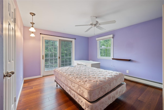 249 Cherry Ln, Airmont, NY 10901 - bedroom with a baseboard heating unit, access to outside, wood-type flooring, baseboards, and a ceiling fan