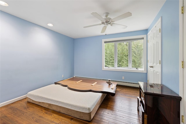 249 Cherry Ln, Airmont, NY 10901 - bedroom featuring recessed lighting, wood finished floors, ceiling fan, baseboards, and a baseboard radiator