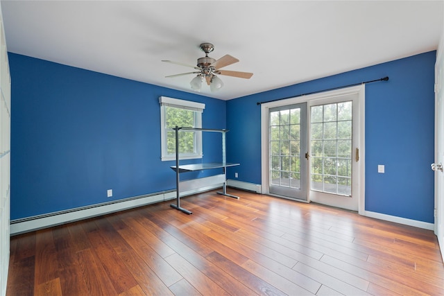 249 Cherry Ln, Airmont, NY 10901 - unfurnished room with a ceiling fan, baseboards, baseboard heating, and wood finished floors