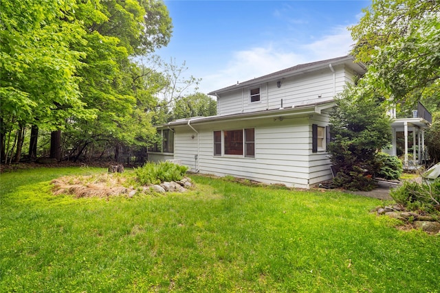249 Cherry Ln, Airmont, NY 10901 - back of house featuring a lawn
