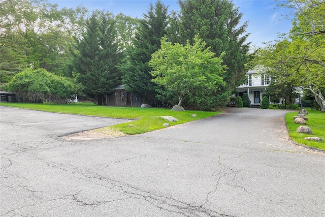 249 Cherry Ln, Airmont, NY 10901 - view of front of house with driveway and a front yard