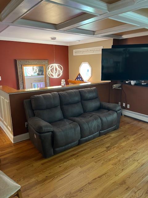 2659 Rte 52, Hopewell Junction, NY 12533 - living room featuring an inviting chandelier, coffered ceiling, and wood finished floors