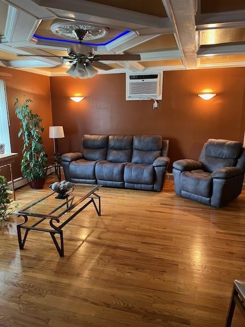 2659 Rte 52, Hopewell Junction, NY 12533 - living area with a ceiling fan, baseboard heating, coffered ceiling, and wood finished floors