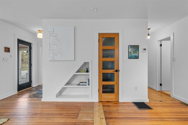 55 Upper Main St, Callicoon, NY 12723 - foyer entrance featuring hardwood / wood-style floors and baseboards
