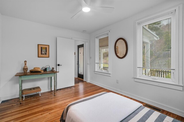 55 Upper Main St, Callicoon, NY 12723 - bedroom with wood finished floors, baseboards, and ceiling fan