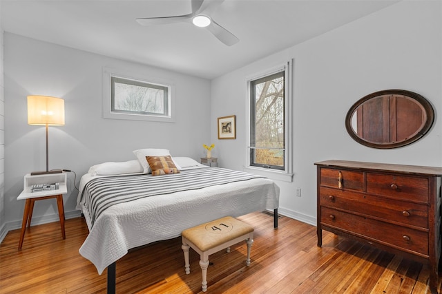 55 Upper Main St, Callicoon, NY 12723 - bedroom featuring multiple windows, light wood-style flooring, and baseboards