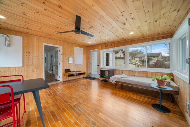 55 Upper Main St, Callicoon, NY 12723 - sitting room featuring wood walls, wood ceiling, hardwood / wood-style flooring, and a ceiling fan