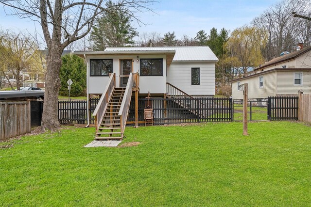 55 Upper Main St, Callicoon, NY 12723 - view of front facade featuring metal roof, stairway, and a sunroom