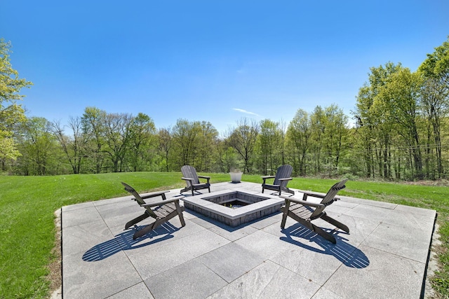 view of patio / terrace featuring a fire pit