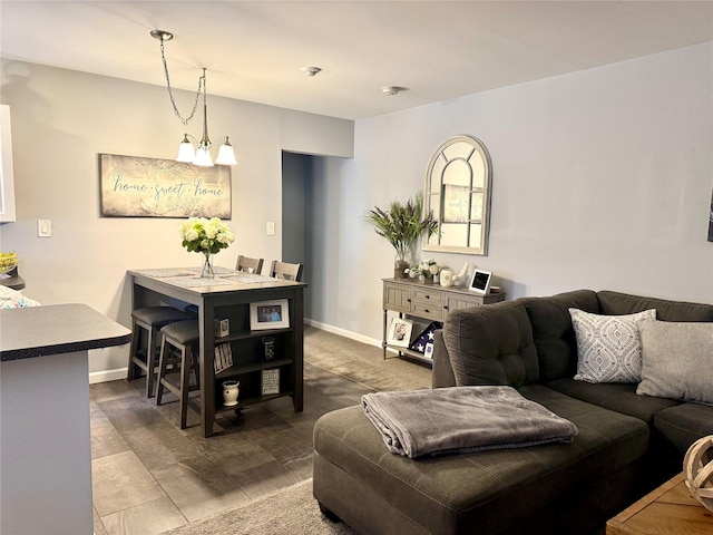 23 Kiowa Ct Unit 23, Coram, NY 11727 - living area featuring baseboards