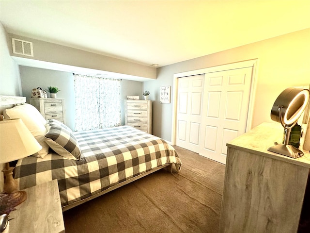 23 Kiowa Ct Unit 23, Coram, NY 11727 - bedroom featuring visible vents, carpet, and a closet