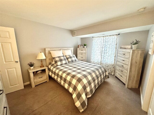 23 Kiowa Ct Unit 23, Coram, NY 11727 - bedroom featuring dark carpet and visible vents