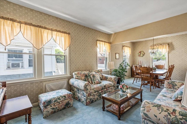 35-30 211th St, Bayside, NY 11361 - carpeted living area with wallpapered walls and healthy amount of natural light