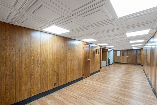 35-30 211th St, Bayside, NY 11361 - empty room featuring wooden walls and light wood-style flooring