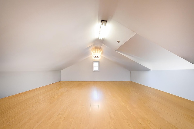 9249 Springfield Blvd, Queens Village, NY 11428 - additional living space featuring lofted ceiling and wood finished floors