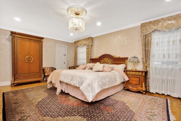 bedroom featuring crown molding, recessed lighting, wood finished floors, and a chandelier