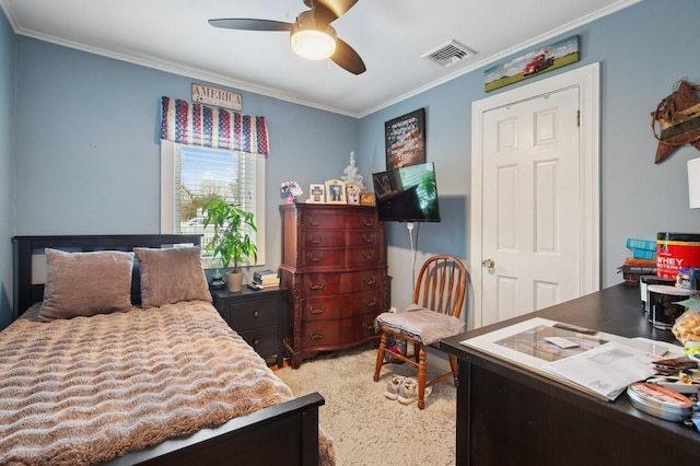 bedroom featuring visible vents, crown molding, and a ceiling fan