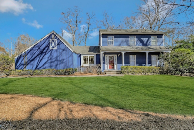 view of front of home with a front yard