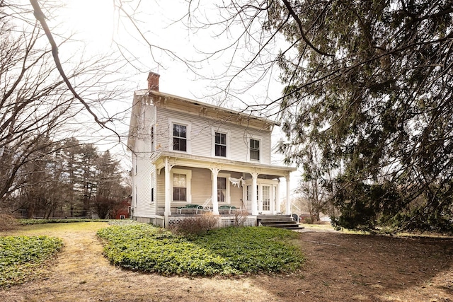 655 Vassar Rd, Poughkeepsie, NY 12603 - italianate house with a porch and a chimney