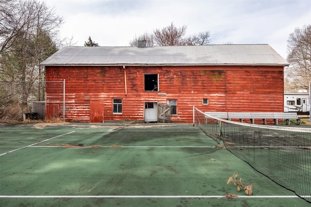 655 Vassar Rd, Poughkeepsie, NY 12603 - back of property with an outbuilding, a barn, and a chimney