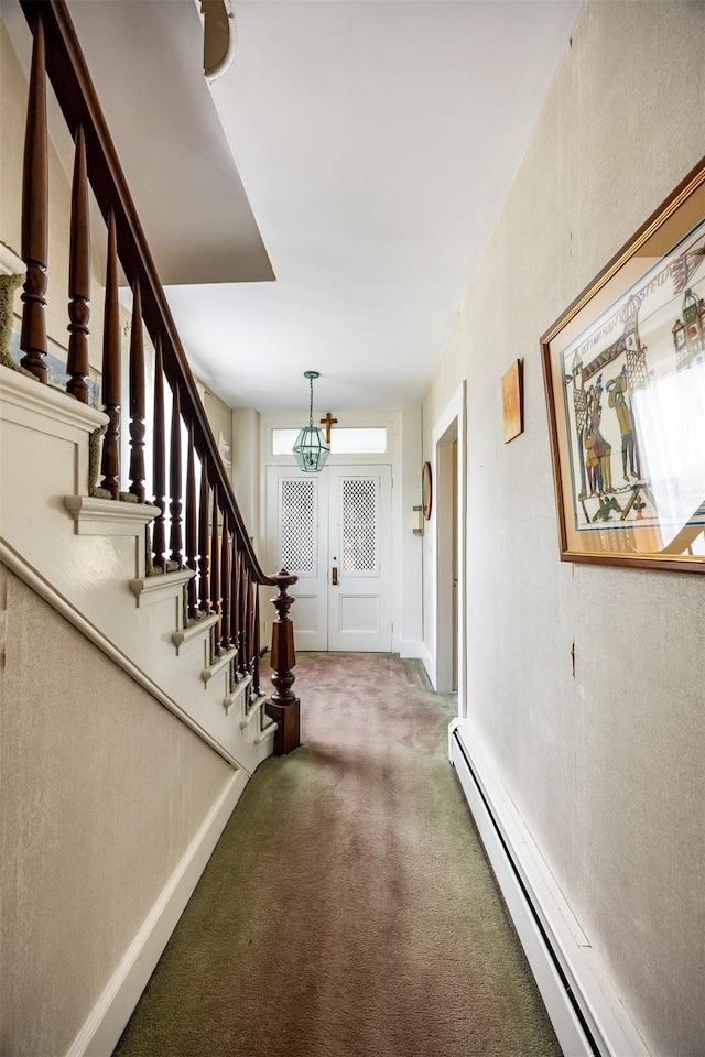 655 Vassar Rd, Poughkeepsie, NY 12603 - corridor with baseboards, a chandelier, carpet, baseboard heating, and stairway