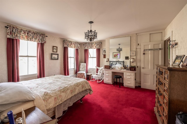 655 Vassar Rd, Poughkeepsie, NY 12603 - bedroom with a chandelier, a textured wall, and dark colored carpet