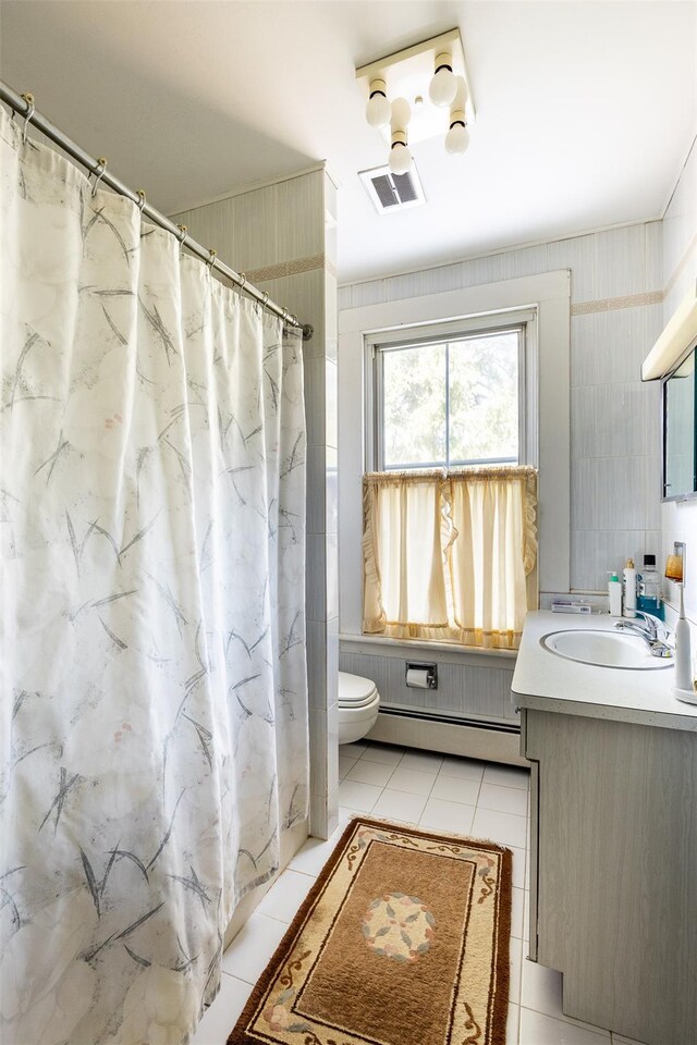 655 Vassar Rd, Poughkeepsie, NY 12603 - bathroom featuring visible vents, a baseboard radiator, tile patterned flooring, and vanity